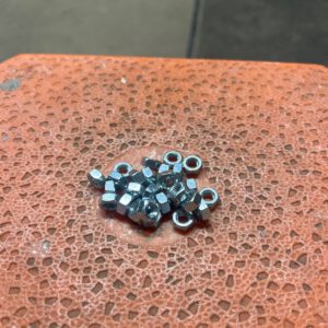820.310 Gegalv moeren 6 mm